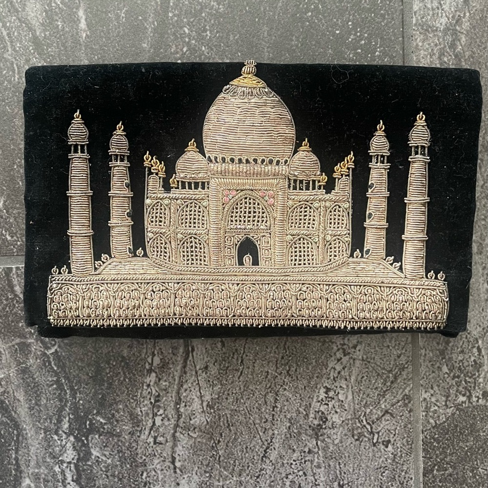 Vintage and rare Elegant Black and Gold Clutch